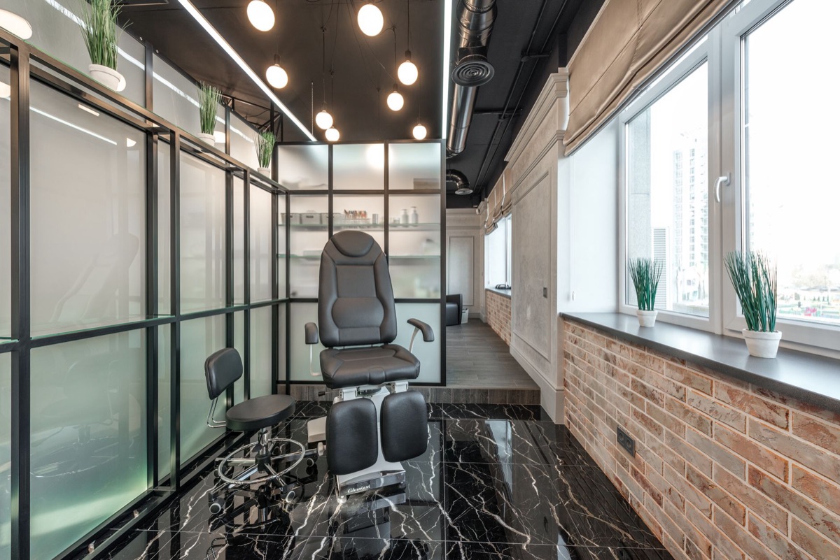 Massage chair in spa with tropical backdrop