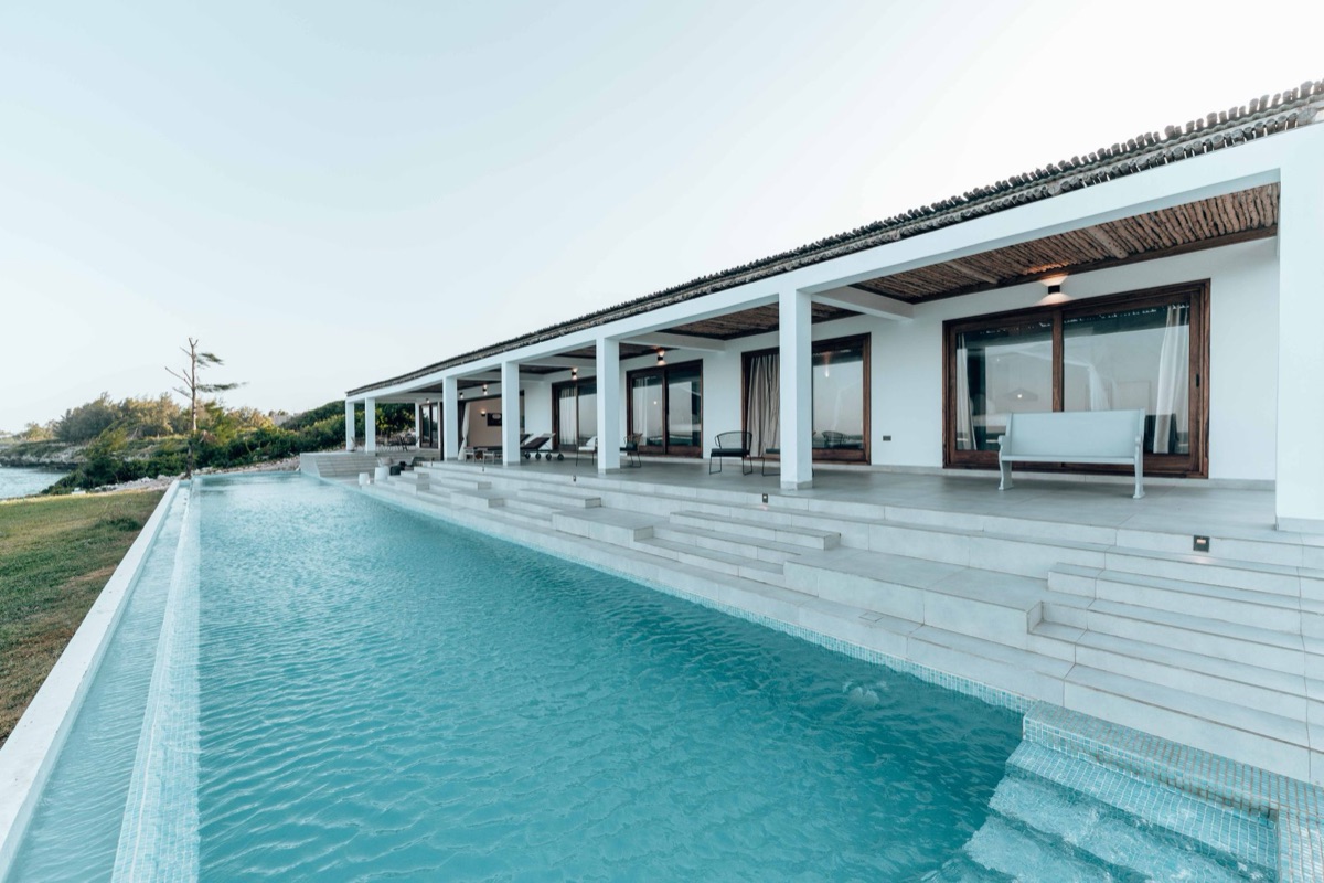 white villa with infinity pool