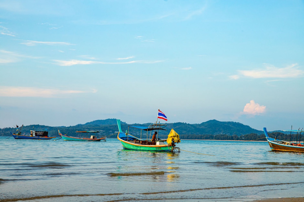 Phuket Local Bar: A cozy, dimly lit bar with locals enjoying drinks in a relaxed atmosphere.