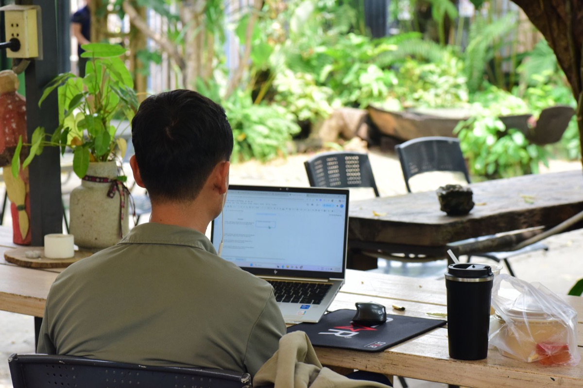 Local phuket resident with laptop
