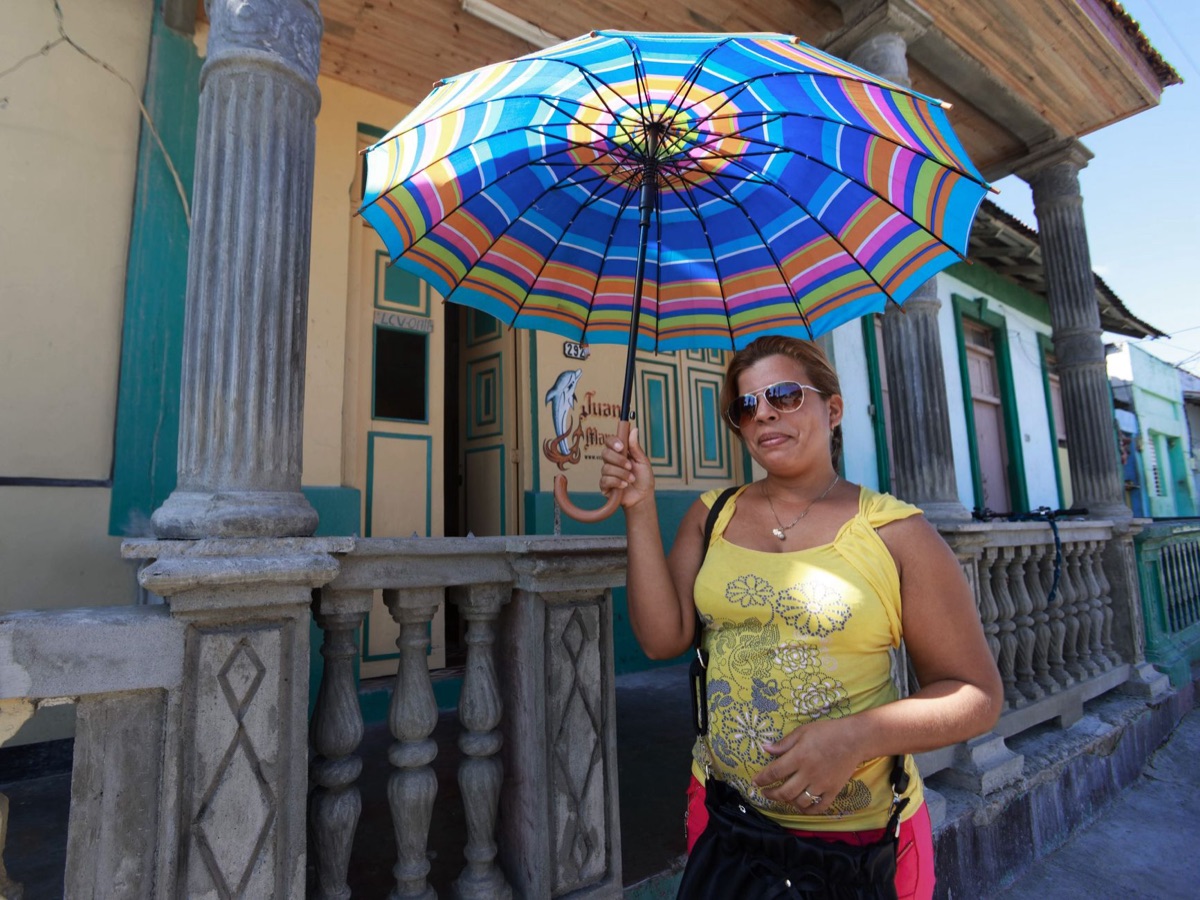Local resident with tropical umbrella